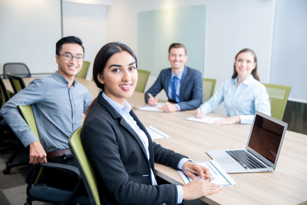 smiling-business-lady-working-with-colleagues